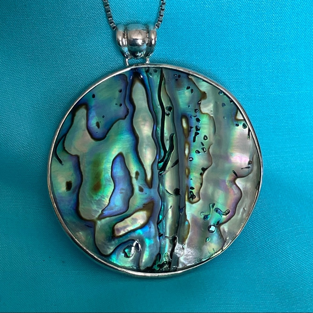Pretty abalone shell and sterling necklace. Signed LUC brand